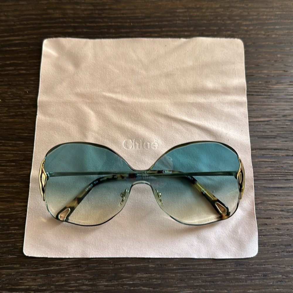 Chloe sunglasses. Gold frames with turquoise blue lenses. Like new. Rare!